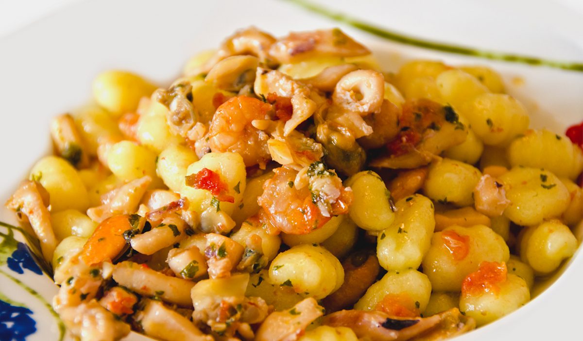gnocchi con sugo di pesce